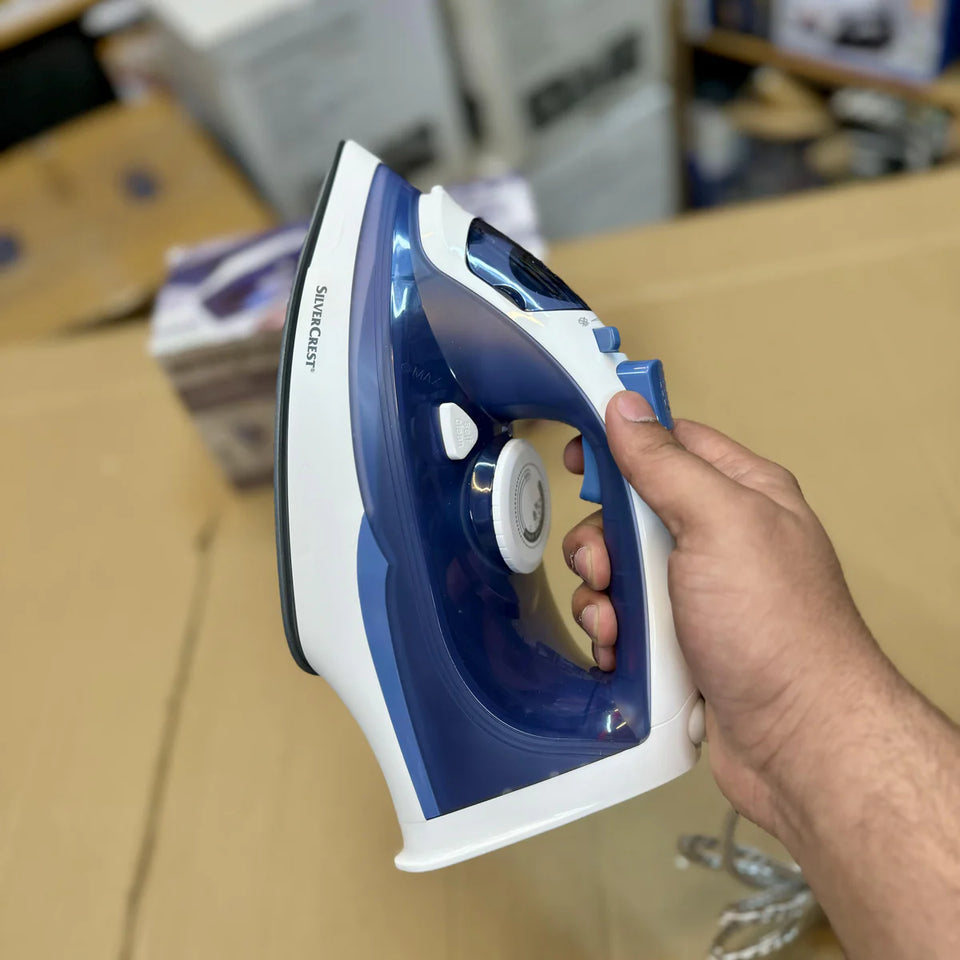 German Lott imported Silver crest steam iron . High Quality