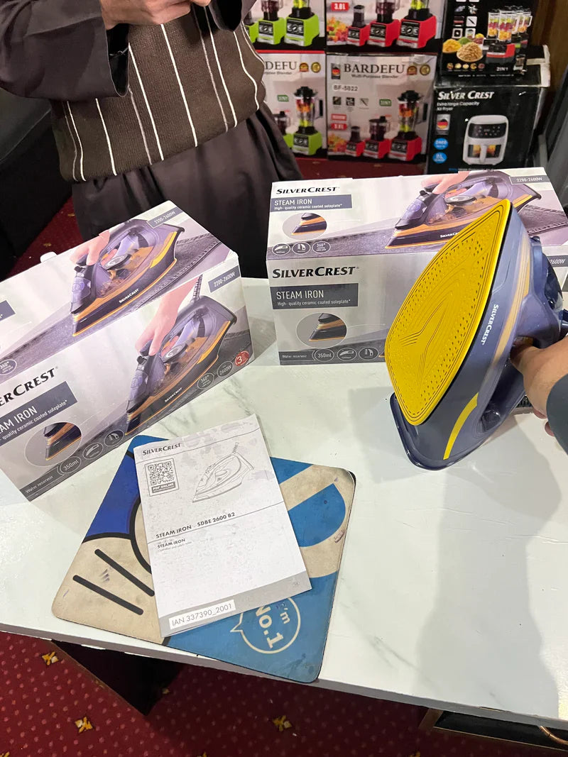 lott imported orginal silver crest steam iron . high quality 2200 watt
