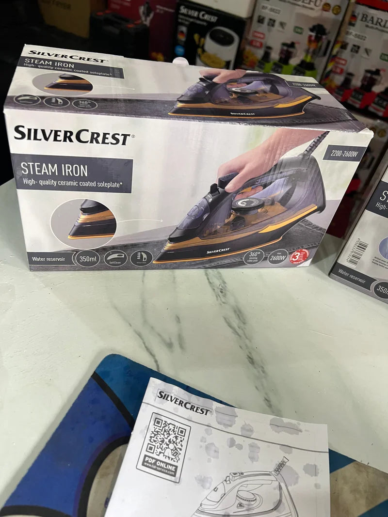 lott imported orginal silver crest steam iron . high quality 2200 watt
